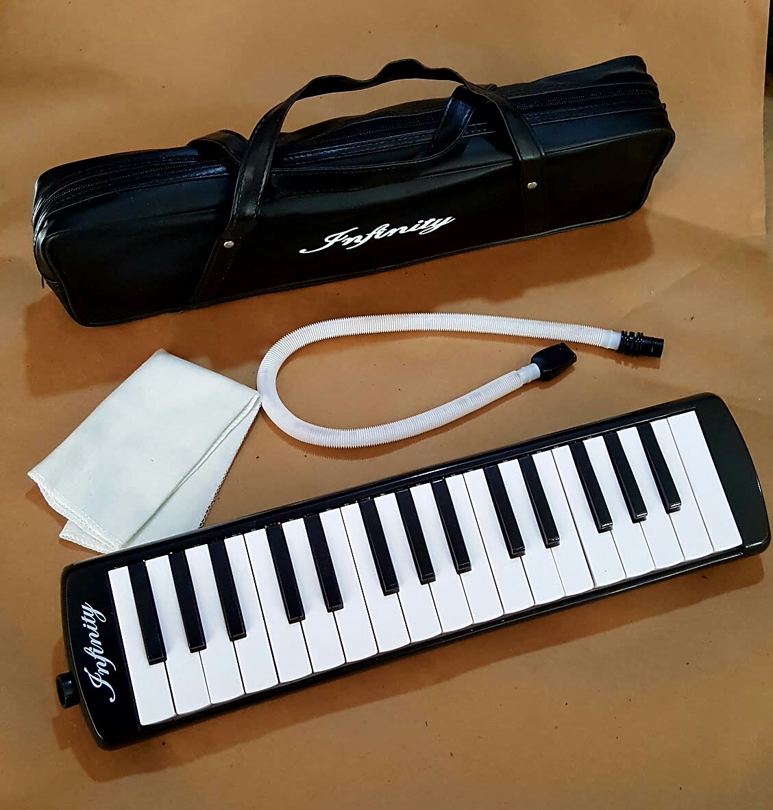 (imagen para) MELODICA de ALIENTO 32 TECLAS-ARMÓNICAS con BOQUILLA, MAN