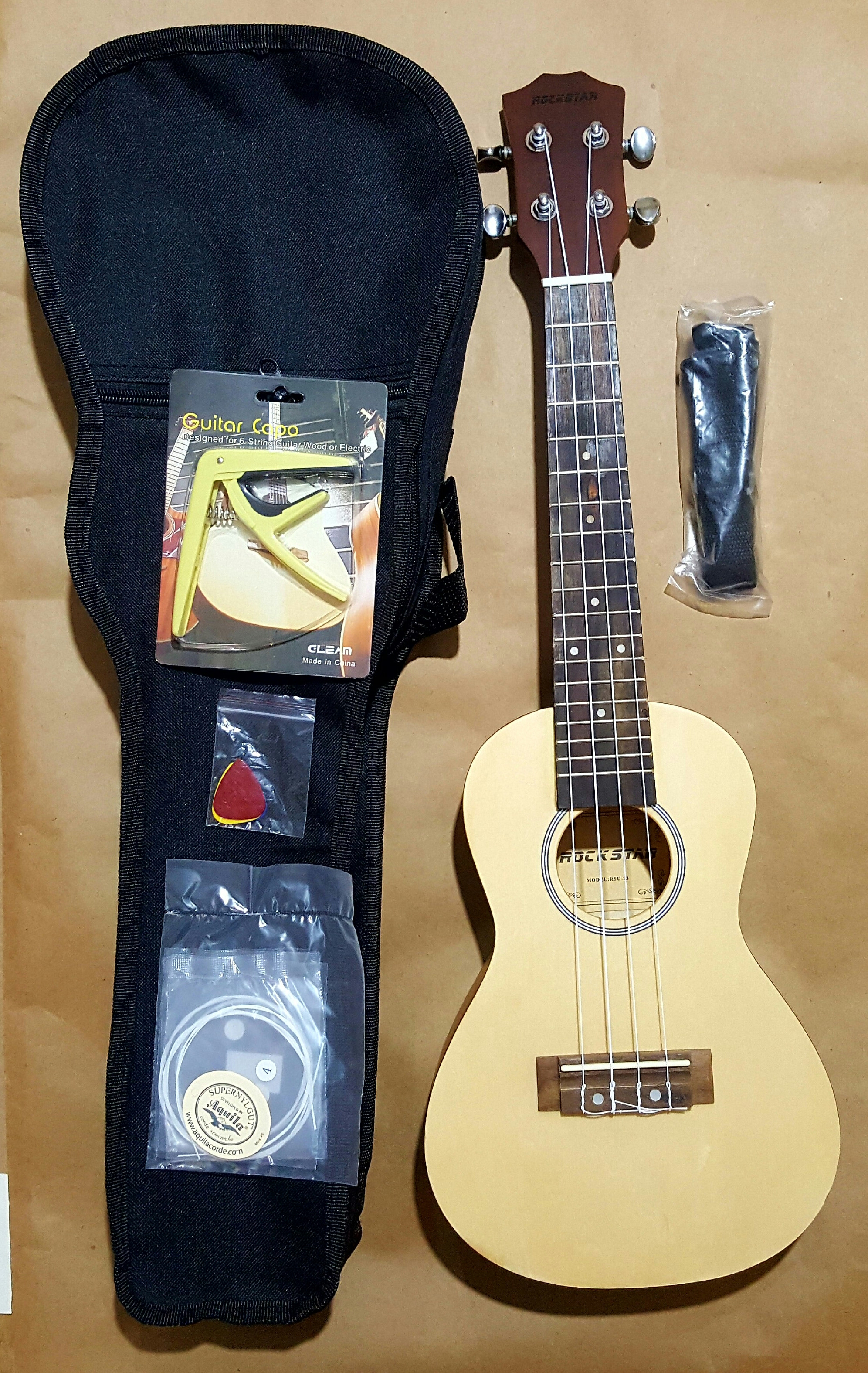 (imagen para) Ukulele de 23" C/ funda, capo, puas y tahalie importado (pz)