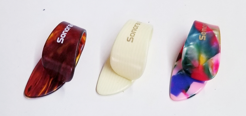 (imagen para) UÑA ANILLO guitarras SONORA MULTICOLOR IMPORT.